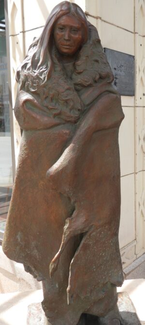 Statue of Native American woman with buffalo hide blanket